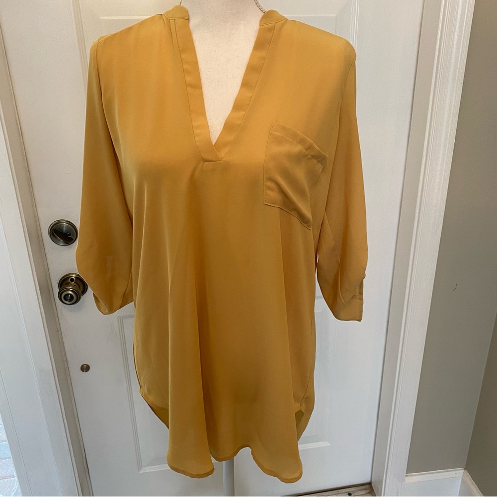 Lush mustard color blouse